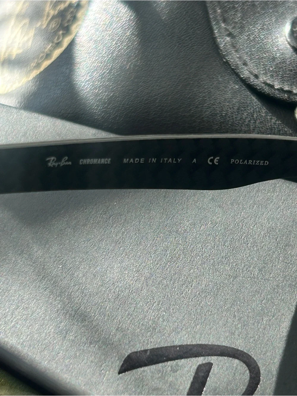 Ray-Ban Black Sunglasses with Silver Lenses